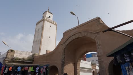 Vibrant-Essaouira-market-at-L'Horloge-d'Essaouira-in-Morocco---Tilt-down-reveal