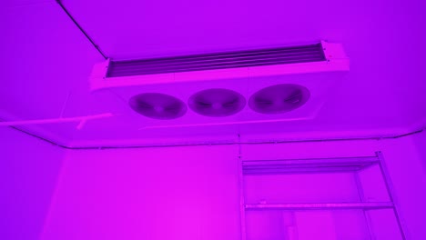 Slow-rotating-shot-of-ceiling-mounted-air-conditioning-units-controlling-the-temperature