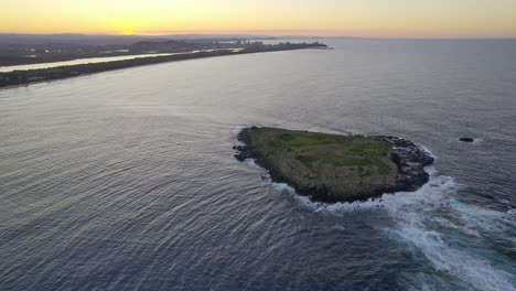 Cook-Island-Against-Sunset-Sky-In-New-South-Wales,-Australia---aerial-shot