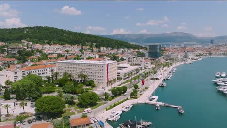 Yacht-harbour-and-skyline-of-Split-in-Croatia-beautiful-summer-day,-aerial-orbit