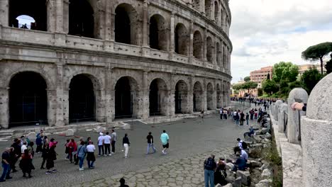 People-Walking-Around-The-Colosseum-In-Rome