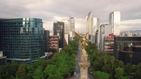 Aerial-view-of-the-Angel-of-Independence-and-Mexico-City-in-the-background
