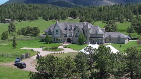 Drone-crane-reveal-luxury-venue-mansion-in-Colorado-Mountains
