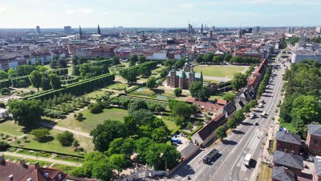 Aerial-wide-of-Copenhagen-city-park-and-Rosenborg-Castle-historic-landmark-and-tourist-attraction-in-Denmark