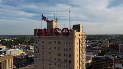 pull-out-drone-shot-of-the-alico-building-in-downtown-waco-texas-4k