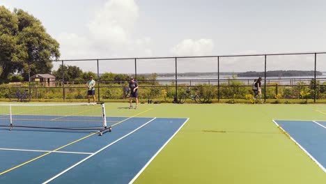 Fouraome-playing-Pickleball-in-Portland,-Maine