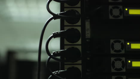 Wayback-machine-internet-archive-library,-Server-rack-with-cables-attached-to-panel-switch-ports,-Close-up-shot