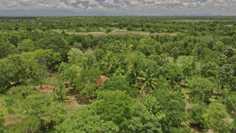 Bogahawewa-Sri-Lanka-Aerial-v6-drone-flyover-the-protected-catchment-area-capturing-beauty-of-Lunugamvehera-National-Park's-shrubland-and-reservoir-wetlands---Shot-with-Mavic-3-Cine---April-2023