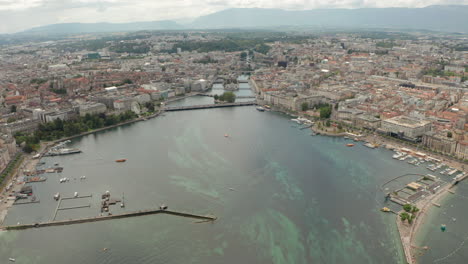 Dolly-back-aerial-shot-over-Geneva-with-the-fountain-off
