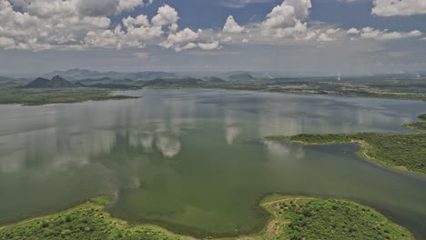 Bogahawewa-Sri-Lanka-Aerial-v2-panoramic-views,-drone-flyover-Lunugamvehera-Reservoir-National-Park-capturing-vast-water-body-and-thriving-wetland-vegetations---Shot-with-Mavic-3-Cine---April-2023