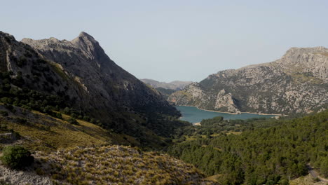 Mountain-valley-in-Mallorca-with-Gorg-Blau-water-reservoir-in-distance