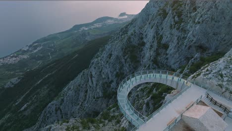 Famous-Skywalk-Attraction-At-The-Nature-Park-Of-Biokovo-Sightseeing-Adriatic-Sea-In-Distance-At-Makarska-In-Croatia