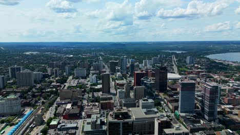 Unveiling-Hamilton's-Urban-Grandeur-Aerial-Drone-Exploration-of-the-downtown-area-mesmerizing-skyscrapers-semi-cloudy-sunny-overview-of-beachfront-properties-stadium-view-stunning-architecture