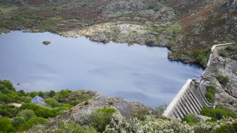 Vega-de-tera-reservoir-zamora-spain,-panoramic-pan-across-water-establishing