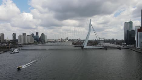 Revealing-drone-shot-of-the-Erasmus-Bridge-in-Rotterdam,-the-Netherlands