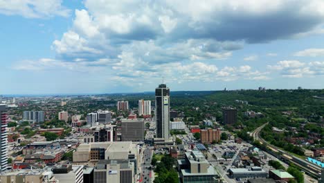 Captivating-Views-of-Downtown-Hamilton's-Tallest-Apartment-Building-from-Above-and-Discovering-the-Natural-Beauty-Forests,-Parks,-and-Aerial-Views-of-the-Breathtaking-Aerial-Tour-of-the-Scenery