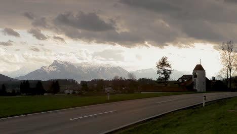 Motorbike-rides-on-road-in-Germany-with-beautiful-alpine-mountain-panorama