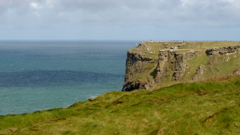 Wide-shot-looking-at-Tintagel-cliffs-from-Lower-Penhallic-Tregatta