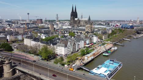 Neighborhood-around-Cologne-Cathedral,-Cityscape,-and-busy-streets-of-Cologne-at-River-Rhine,-Germany