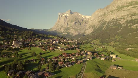 pushing-in-towards-Endweg-in-Grindelwald-with-view-of-majestic-Mount-Wetterhorn-in-background