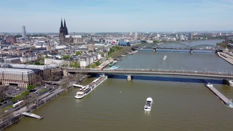 Aerial-view-of-Cologne-cityscape-with-the-view-of-Cologne-Cathedral,-Deutzer-Bridge-and-Hohenzollern-Bridge