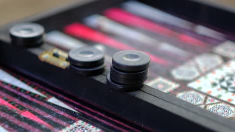 two-men-are-playing-backgammon-close-up