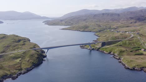 Dynamic-drone-shot-of-the-bridge-connecting-the-Isle-of-Scalpay-to-the-Isle-of-Harris-on-the-Outer-Hebrides-of-Scotland