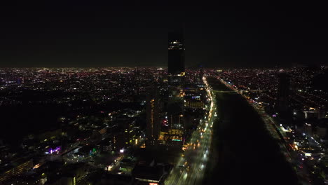 Aerial-view-in-front-of-the-Torres-Obispado-complex,-night-in-Monterrey,-Mexico