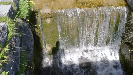 Streams-Of-Water-Flowing-Down-Concrete-Steps-During-Sunny-Day