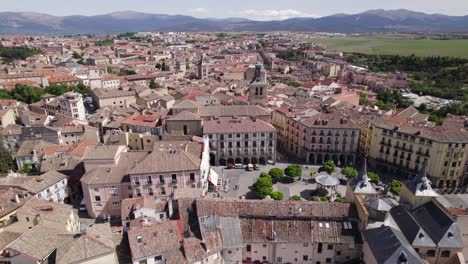 Cinematic-flyover-of-Segovia-Plaza-mayor,-view-over-residential-area