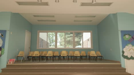 Interior-gimbal-shot-of-an-open-room-classroom