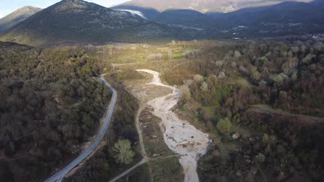 Aerial-view-of-valley-with-a-dried-up-river-running-through