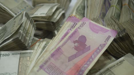 Stack-of-real-Indian-banknotes-2000-and-500,-Closeup-shot