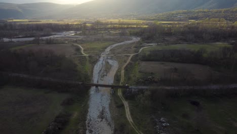 Aerial-of-dried-up-river-in-the-middle-of-a-beautiful-valley-in-winter