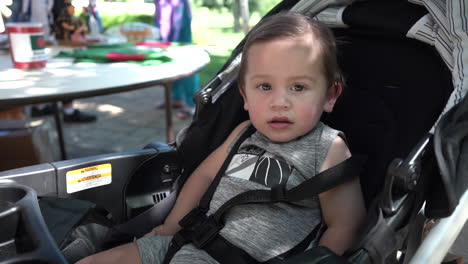 hispanic-mexican-american-biracial-latino-toddler-boy-sitting-in-stroller