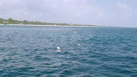 Floating-Buoys-Near-Tropical-Coast-Of-Diani-Beach,-Indian-Ocean-In-Kenya