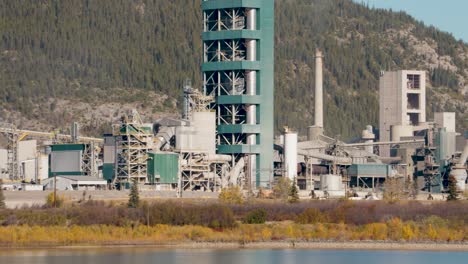 A-Panning-Shot-of-the-Lafarge-Exshaw-Limestone-Cement-Plant-Industrial-Building-off-Trans-Canada-Highway-One-in-the-Canadian-Rocky-Mountains