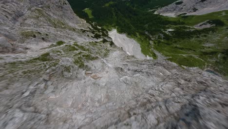 Fast-drone-flight-down-a-steep-mountain-in-Tyrol-region-of-Austria
