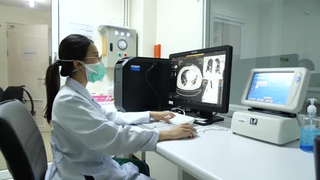 Laboratoty-Staff-Perform-MRI-Scan,-Editorial