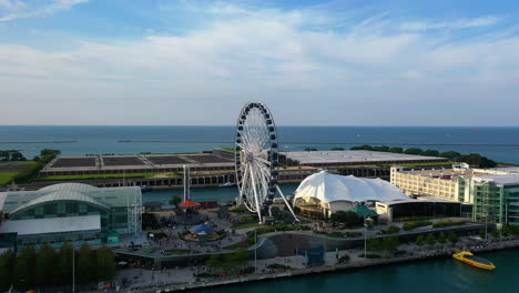 Aerial-view-around-the-Centennial-wheel-at-a-Navy-pier,-golden-hour-in-Chicago,-USA