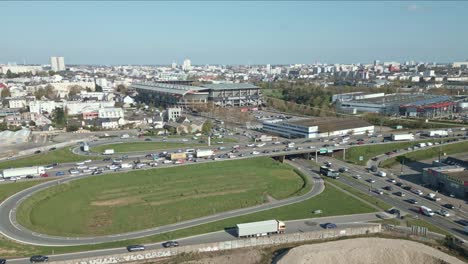 Roazhon-Park-football-stadium-of-Rennes-in-Brittany-and-car-traffic,-France