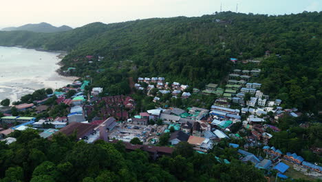Koh-Phi-Phi-aerial-orbit-of-walking-street-and-hillside-villas-overlooking-bay