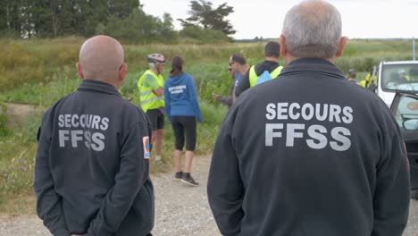 Race-Safety,-Rescuers-Monitoring-a-Cycling-Event-from-Behind