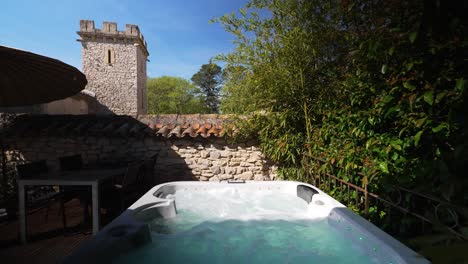 Slow-establishing-shot-overhead-a-villa-in-Nimes-with-a-luxury-hot-tub-running