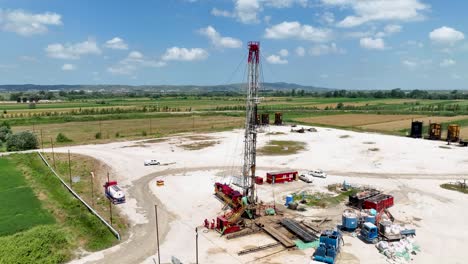 Panoramic-shot-of-oil-drill-in-industrial-site-excavating-for-diesel