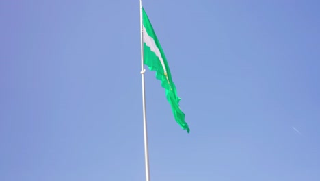 Waving-flag-of-Andalusia,-Spain