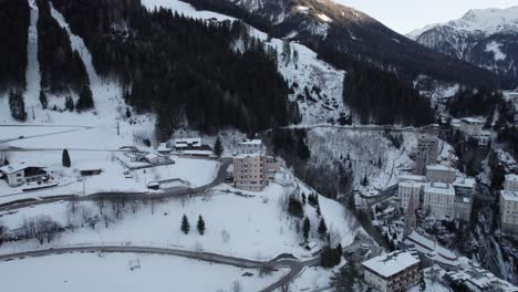 Drone-View-of-Mountain-Hotel-in-Snowy-Landscape-in-Austria-Frozen-Landscape