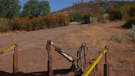 4k-tractor-plow-rusting-on-a-ranch