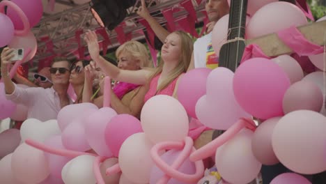 Pink-truck-with-people-dancing-in-pink