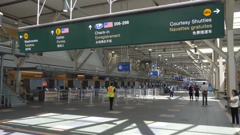 Check-in-Hall-Vancouver-Airport-with-Tourists-Traveling-STATIC